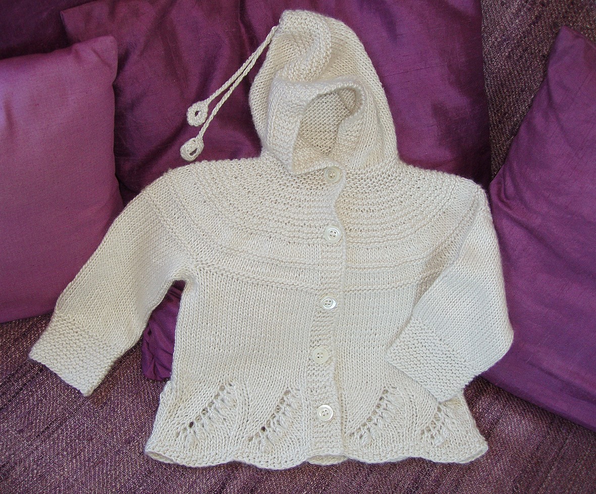 Baby Cardigan with Border in Lily-of-the-Valley Pattern